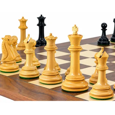 Light boxwood pieces from the Parthenon set arranged on the maple board