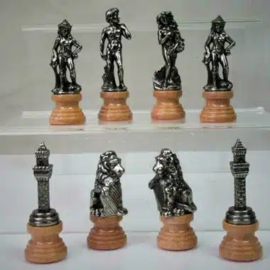 Silver-tone Florence chess pieces on light wood bases, mythological figures
