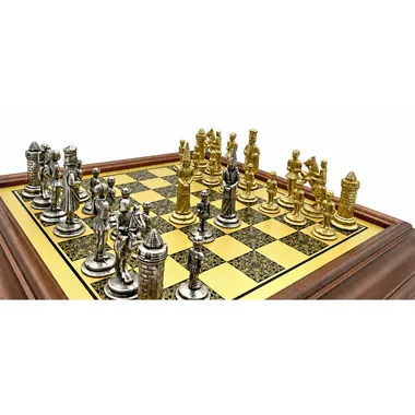Camelot King Arthur pieces arranged on the gold and black chessboard