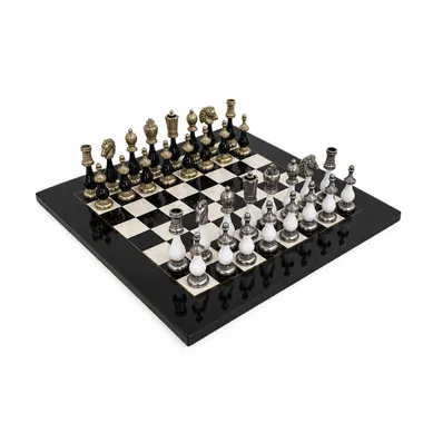 Two-tone V chess set arranged on the maple wood chess board