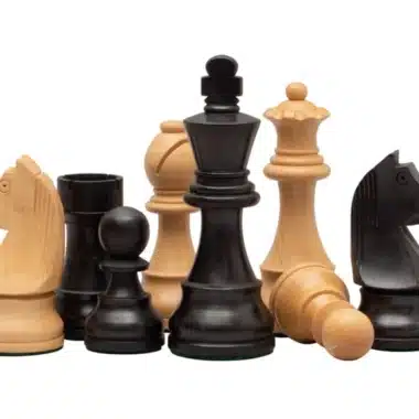 Boxwood and ebonised boxwood chess pieces grouped together, detailed overview