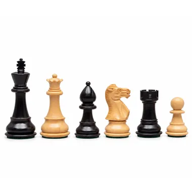 Staunton chess pieces in natural and ebonised boxwood lined up