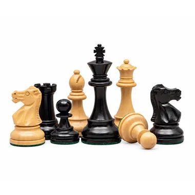 Chess pieces grouped together showing carved details of the knight and king