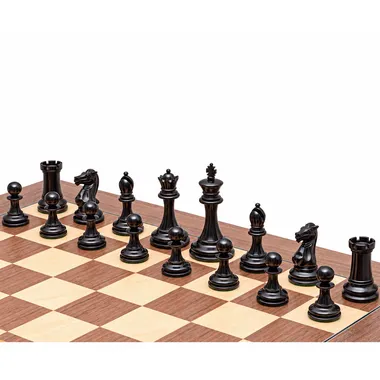 Black ebony pieces from the Rochester set lined up on the walnut chess board