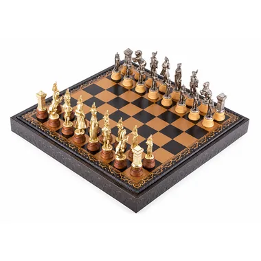 Complete Napoleon chess set: gold and silver pieces on a black and gold board