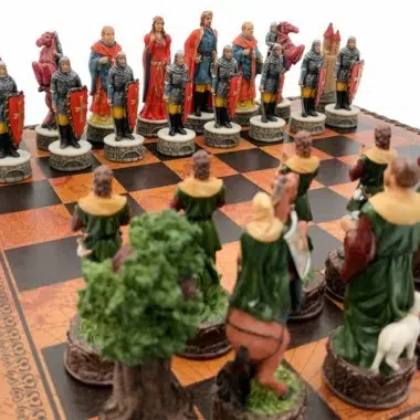 Detailed Robin Hood chess pieces facing each other on the faux leather board