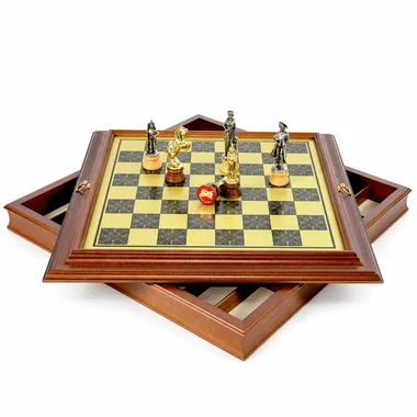 Open storage box showing the compartment and metal chess pieces
