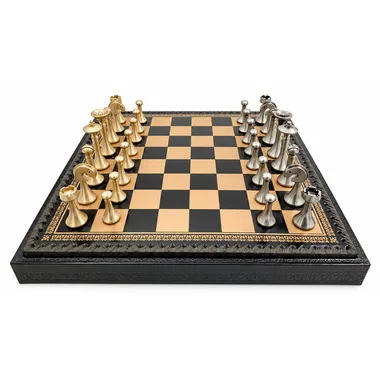 Contemporary chess set with brass pieces arranged on the two-tone board