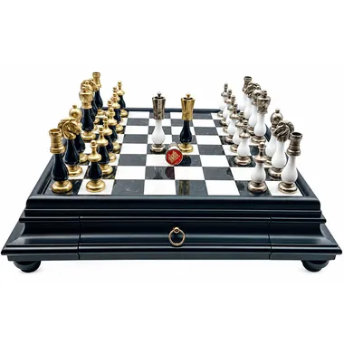 Arabesque wood and alabaster chess board close-up with pieces lined up