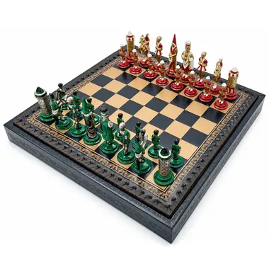 Red and green Camelot chess pieces lined up on the open board