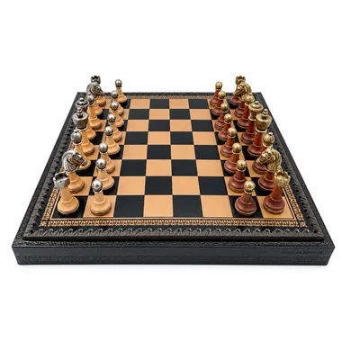 Complete chess set on a chess board with ornate faux-leather frame