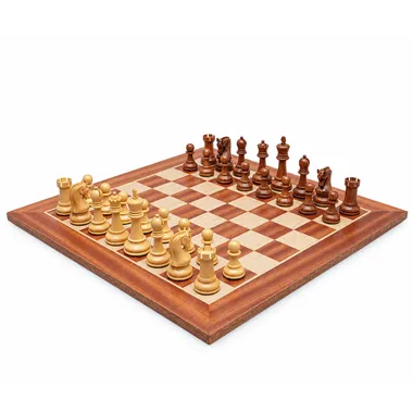 Acacia wood chess set arranged on the mahogany chessboard, overall view
