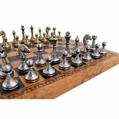 Faux-leather marquetry chess board with gold and silver metal pieces lined up