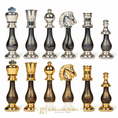 Complete chess set in gold and silver-plated brass, both sides facing each other