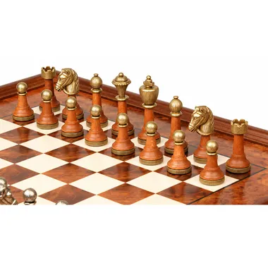 Light and dark wood pieces with golden details, close-up view