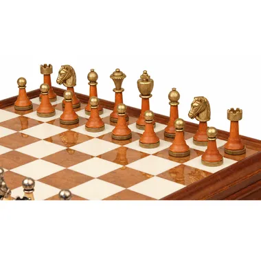 Gold-toned wood and metal pieces, detail of pawns and engraved knight