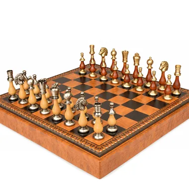Wood and metal pieces of the Grand Oriental chess set lined up on the board