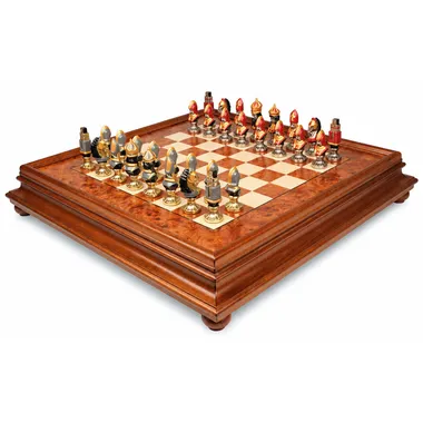 Complete Moncada chess set on burl wood chessboard with storage box