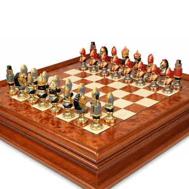 Hand-painted Moncada chess pieces lined up on the burl wood chessboard