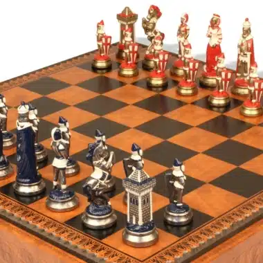 Mary Stuart chess pieces in metal viewed at an angle on the board
