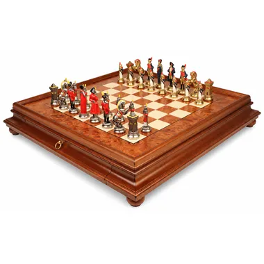 Napoleon chess set displayed on a burl wood chess board with drawer
