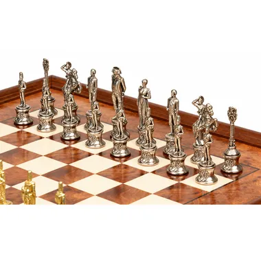 Detailed silver-tone Napoleon chess pieces on the elm wood board