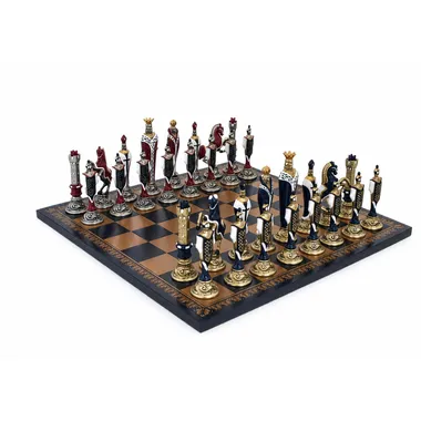 Complete Renaissance chess set in painted metal arranged on the gold and blue board