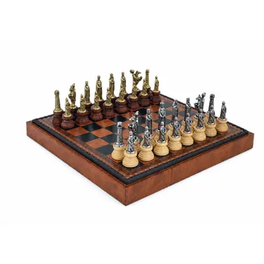 Complete medieval chess set on brown and black faux leather chessboard