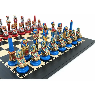 Blue and red pieces of the Egypt chess set arranged on the board
