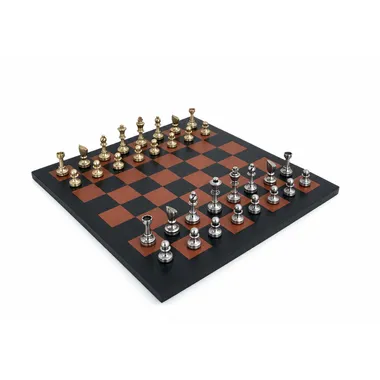 Complete chess set in gold and silver brass on a leather chess board