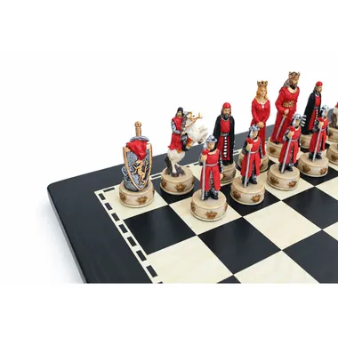 Close-up of the red pieces, king, queen and knight on the board