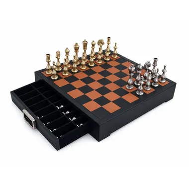 Complete metal chess set on leather chessboard with storage drawer