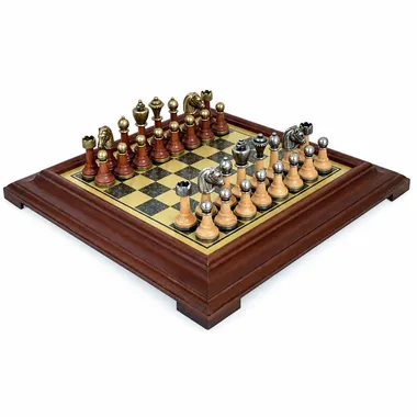 Wooden chess board with brass-effect top and metal Staunton pieces
