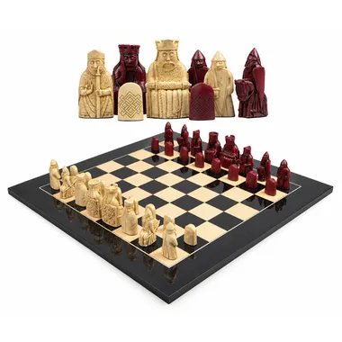 Complete Isle of Lewis chess set in red and cream resin on lacquered board