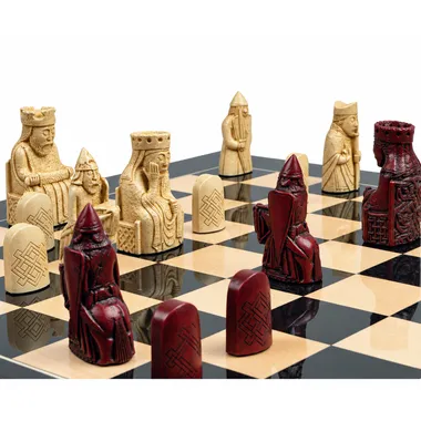 Isle of Lewis pieces in red and cream facing each other on the board