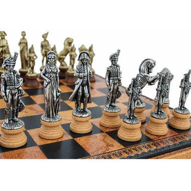 Napoléon chess pieces in silver-toned metal on the board, soldiers in detail