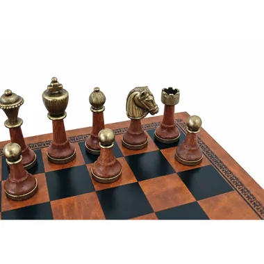 Close-up of Staunton metal and wood pieces, king, knight and rook on the board