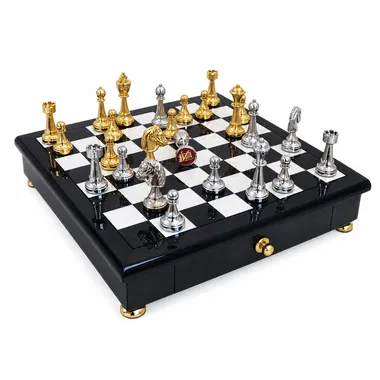 Complete Staunton chess set gold and silver plated on black and white board with drawer