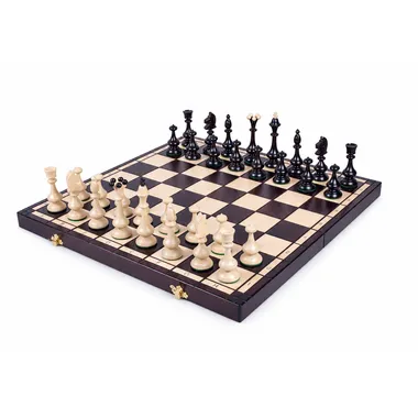 Folding wooden chess board with dark and light pieces set up, front view