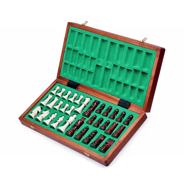 Open storage box lined with green felt holding all the chess pieces