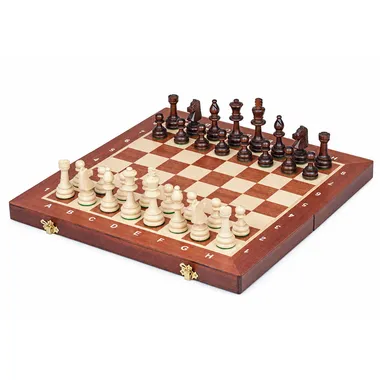 Folding wooden chess board with light and dark pieces in starting position