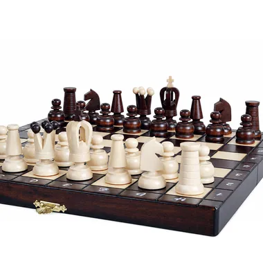 Folding travel chess set, light and dark wooden pieces on the board