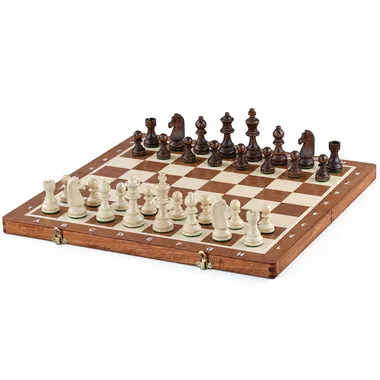 Complete chess set with wooden pieces arranged on a folding chessboard