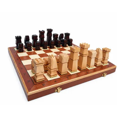 Cubic wooden chess set displayed on the open folding board
