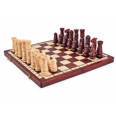 Large folding wooden chess board with carved pieces set up