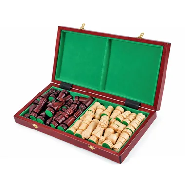 Open box showing the carved pieces stored inside the green interior