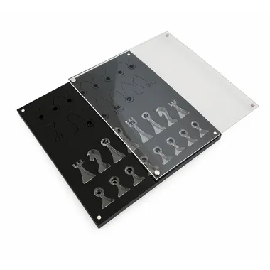 Open plexiglass storage box showing the slots for the pieces