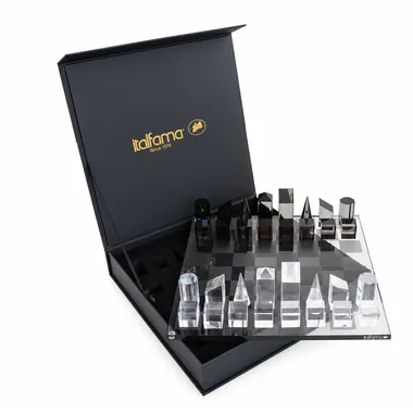 Open storage box with grey cube chess pieces on the board