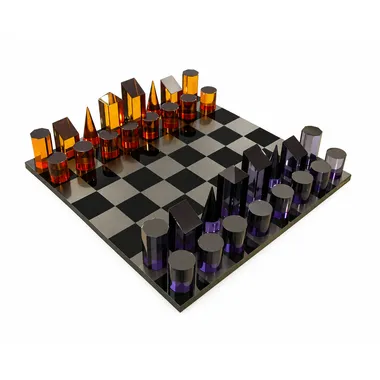 Cylindrical plexiglass chess set in amber and purple on a black board