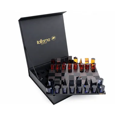 Open storage box with cylindrical plexiglass chess set
